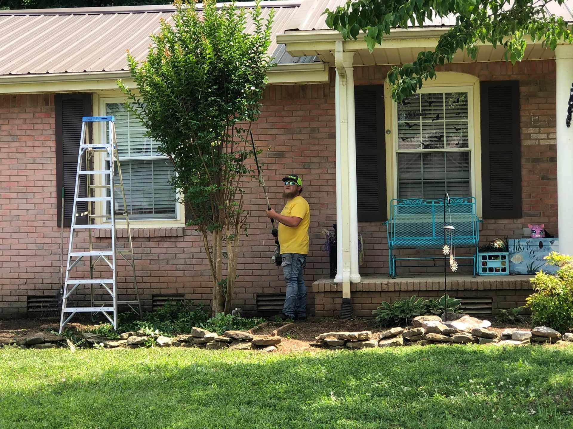 photos of the crew at pro-turf working on outdoor projects