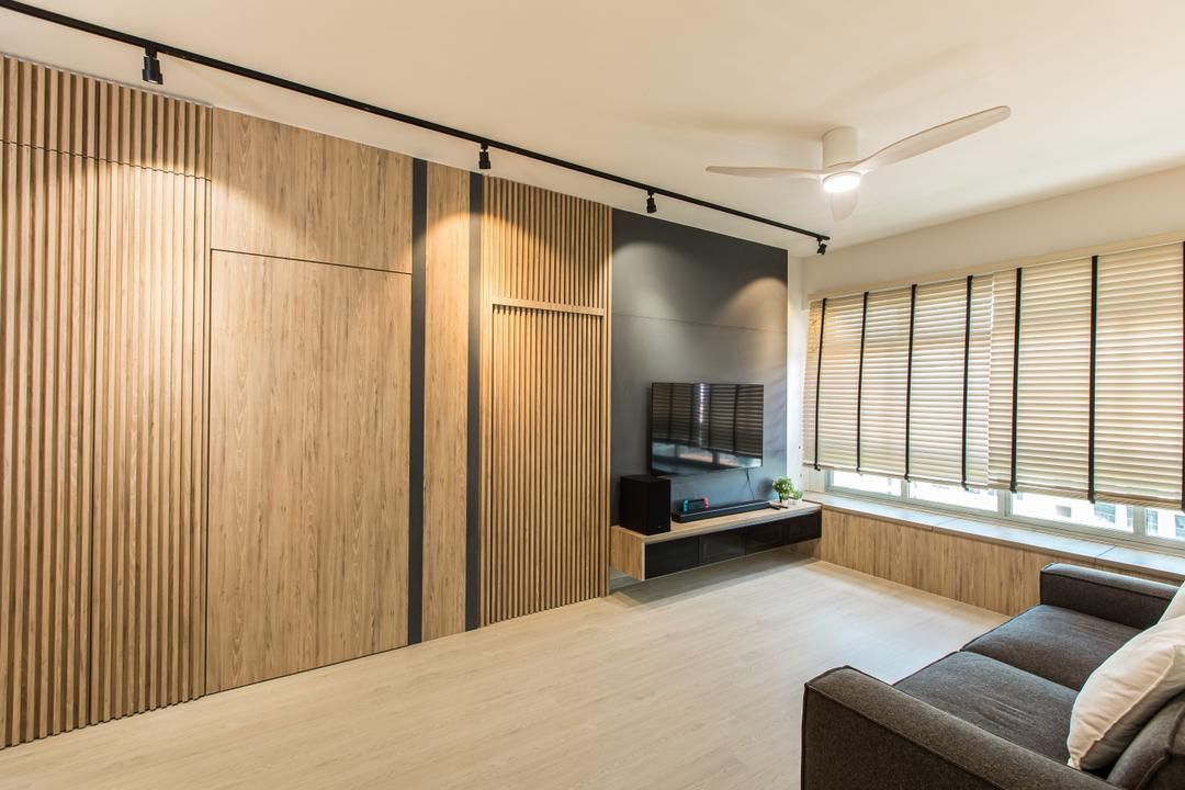 a man is installing a sink in a bathroom .