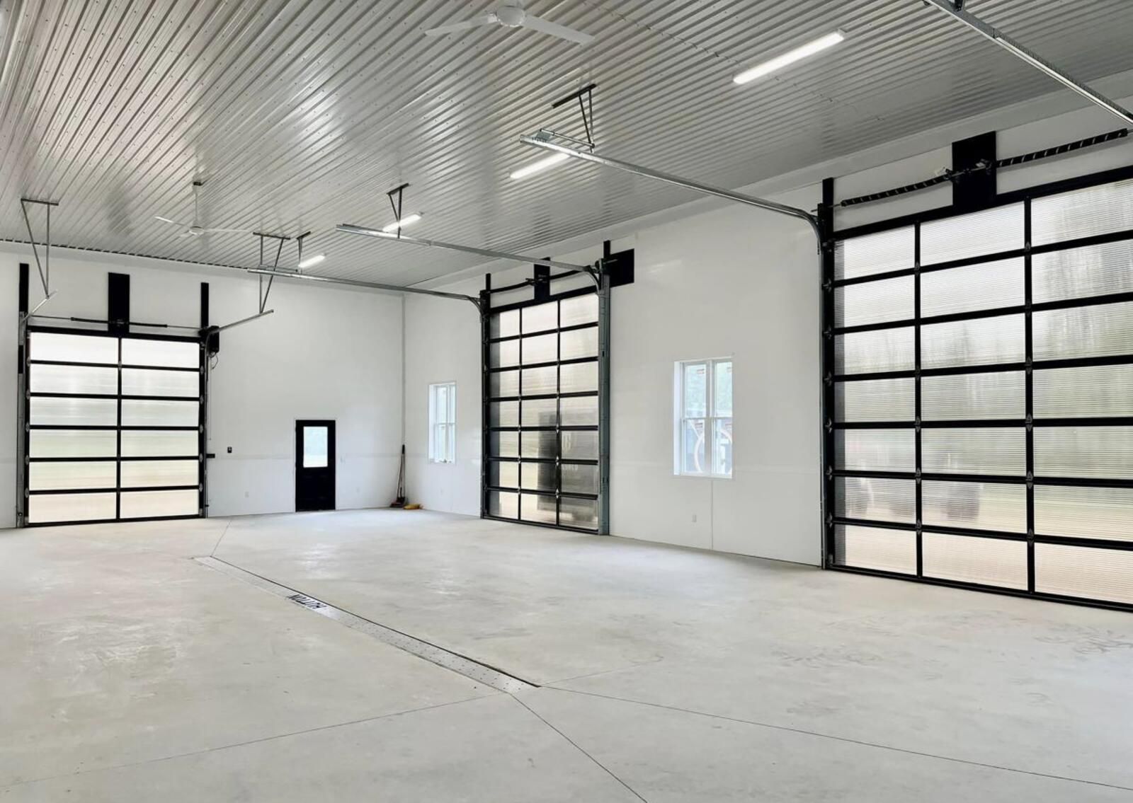 a bathroom with two sinks and a large mirror .