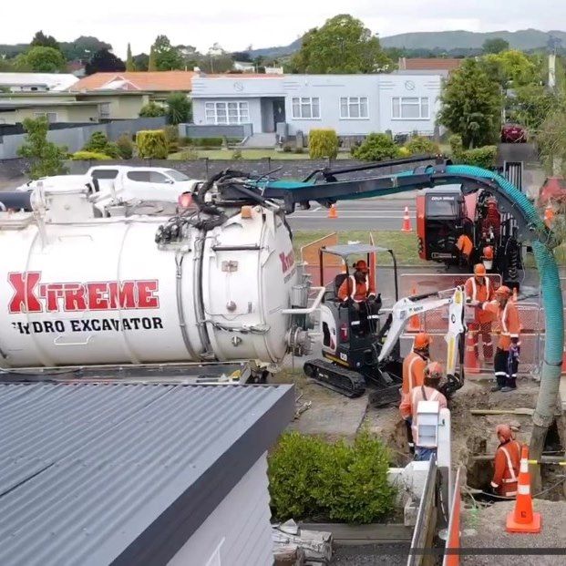 A xtreme hydro excavator is being used to dig a hole