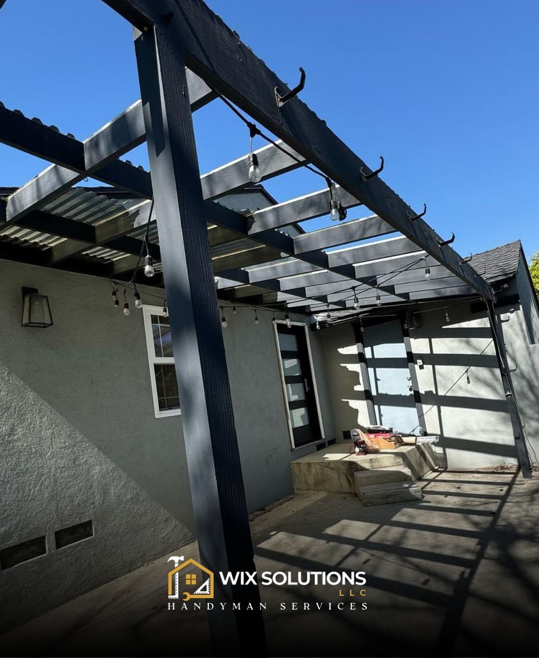 A patio with a pergola and a sign that says wix solutions