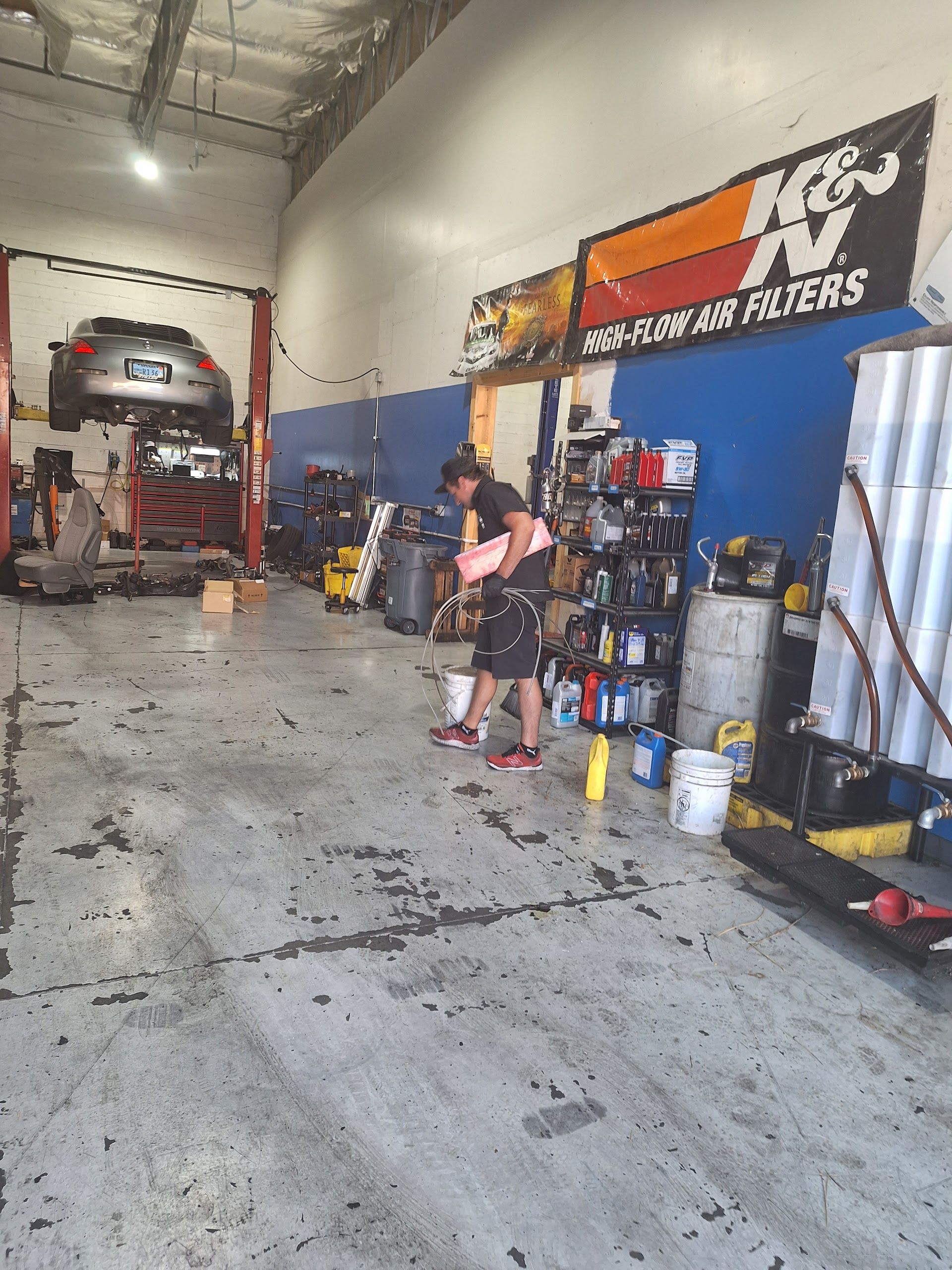 Mechanic Working in Auto Repair Bay | Urban Auto Workz