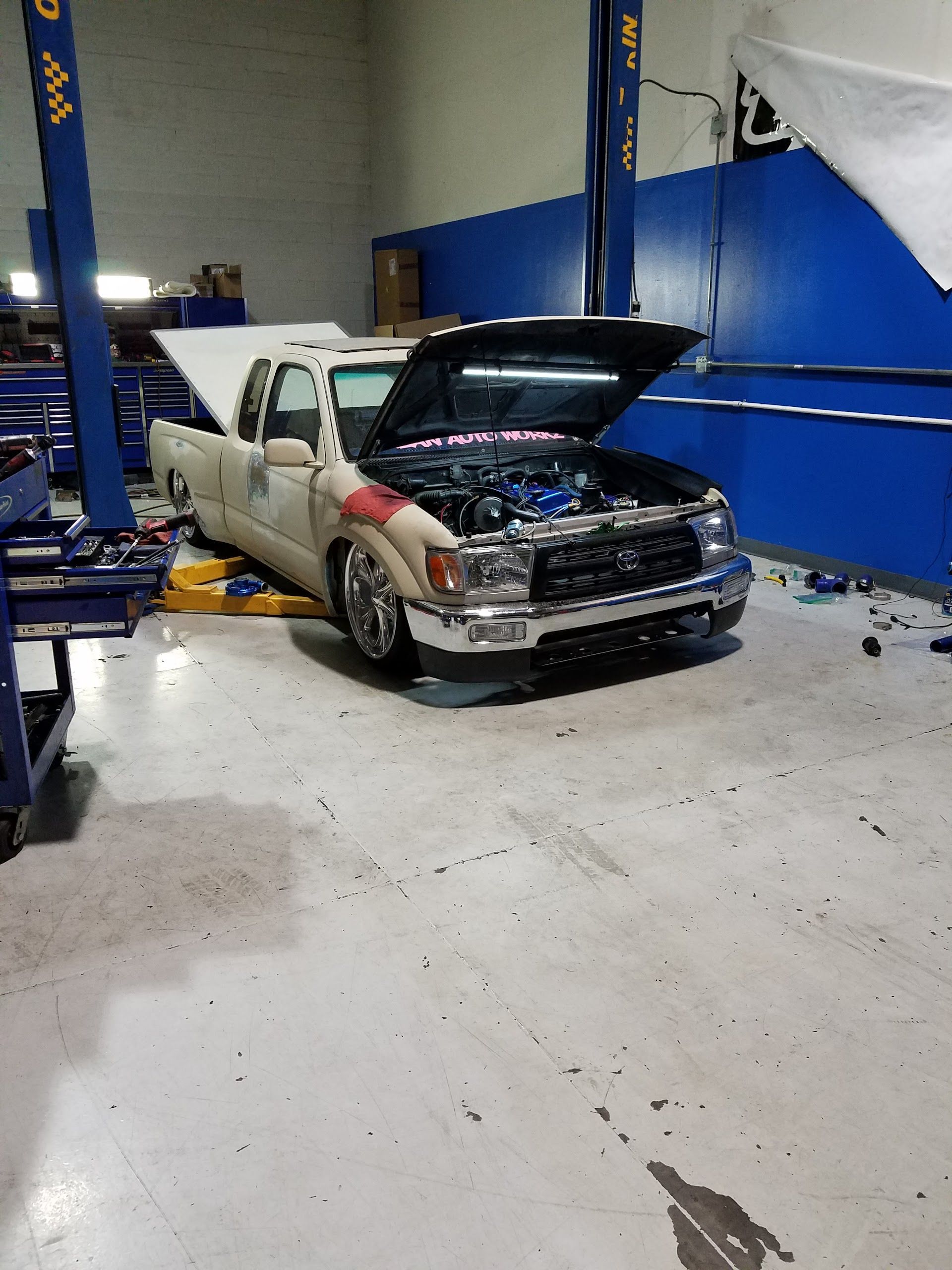 Pickup Truck With Open Hood Inside Shop | Urban Auto Workz