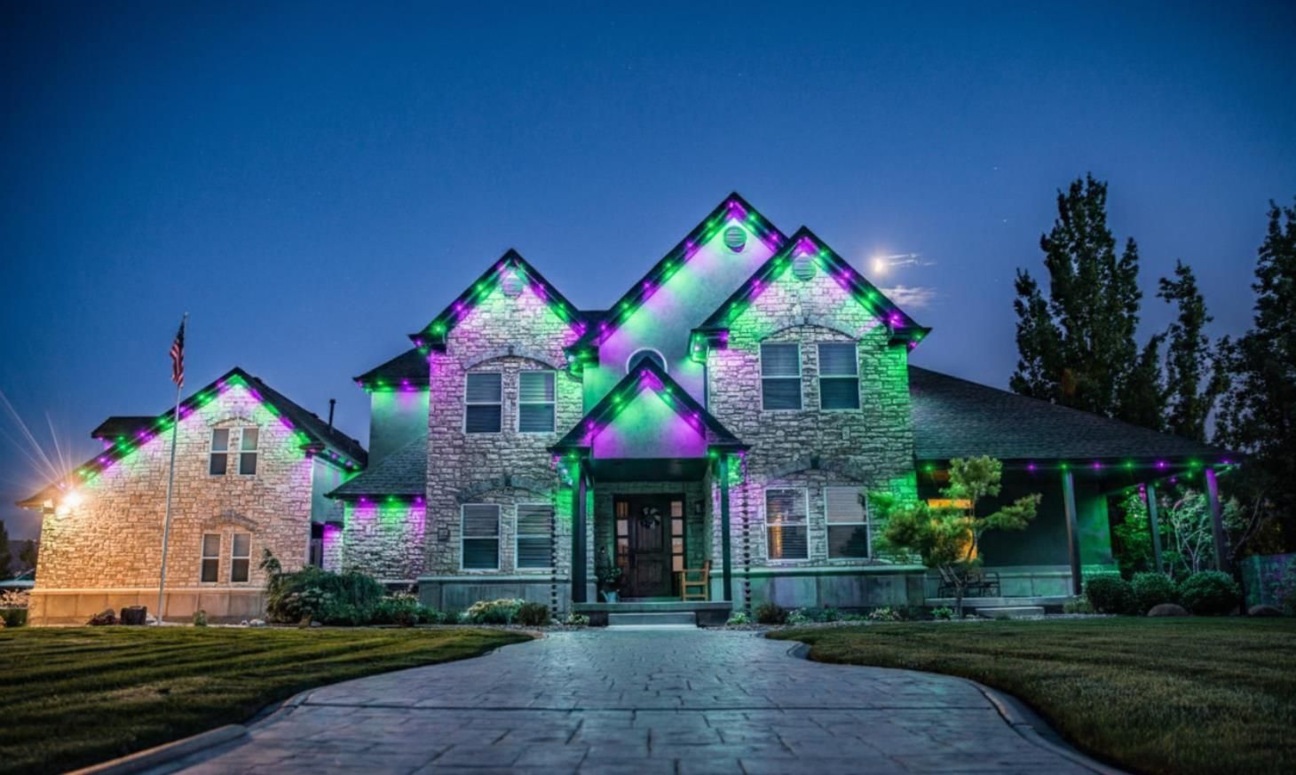 Skilled contractor electrician installing a light bulb in a fixture.