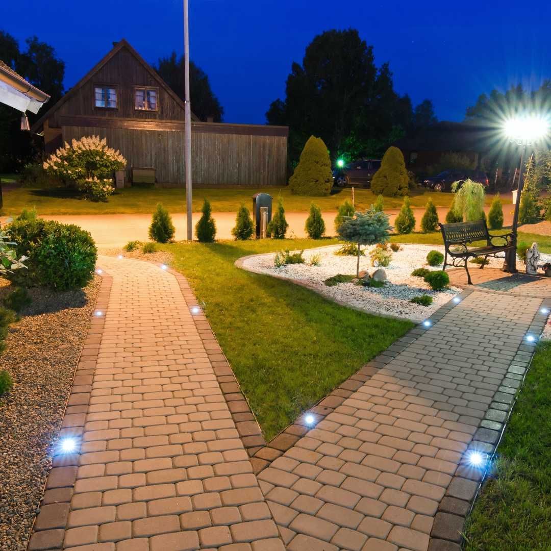 a person is installing a light in the ceiling