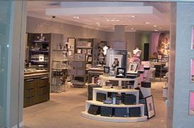 A store with a lot of shelves and pictures on them