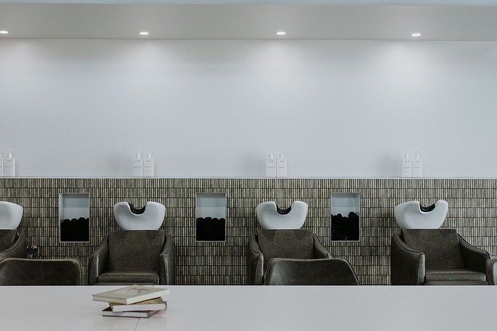 A Row of Chairs with Sinks in A Hair Salon — Rowe Street Collective In Shepparton, VIC