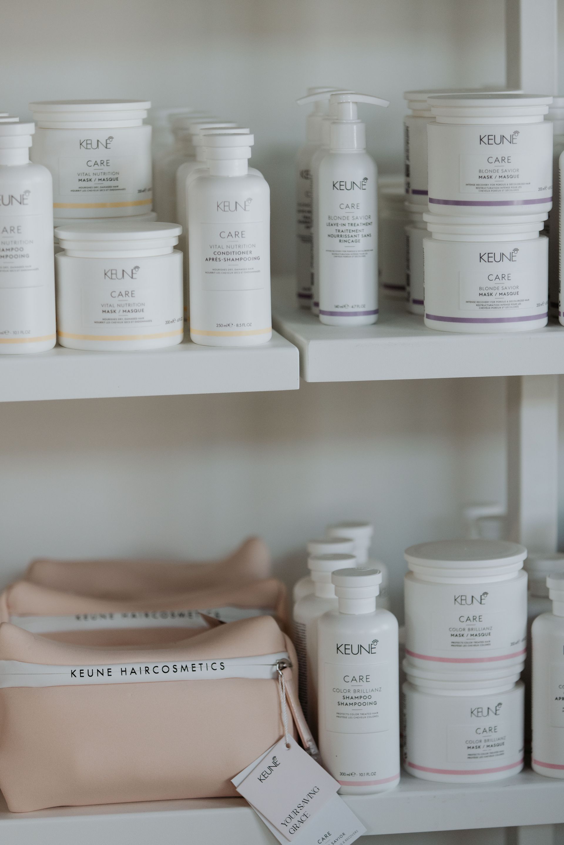 A shelf filled with lots of bottles and jars of cosmetics. — Rowe Street Collective In Shepparton, VIC