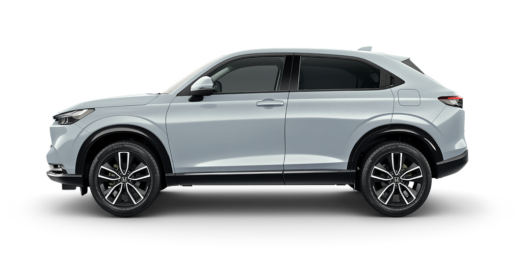 Silver SUV in side view on a white background