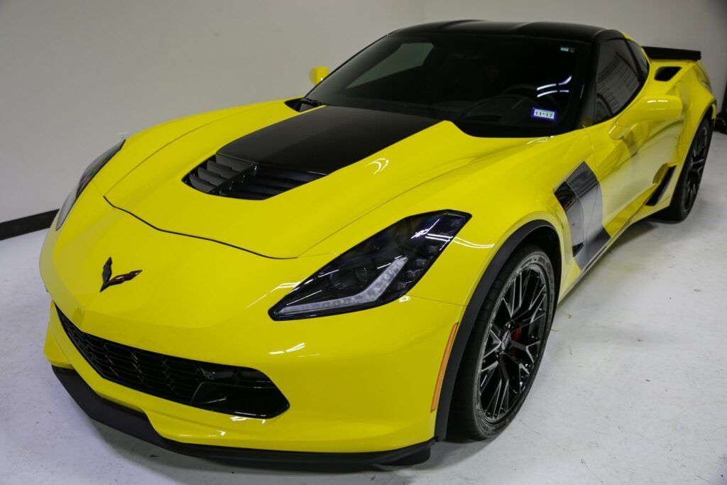 Yellow and black Chevrolet Corvette sports car.