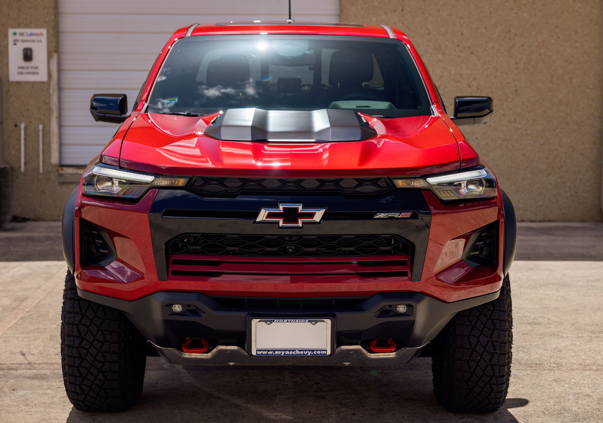 Red Chevrolet Colorado ZR2 pickup truck.