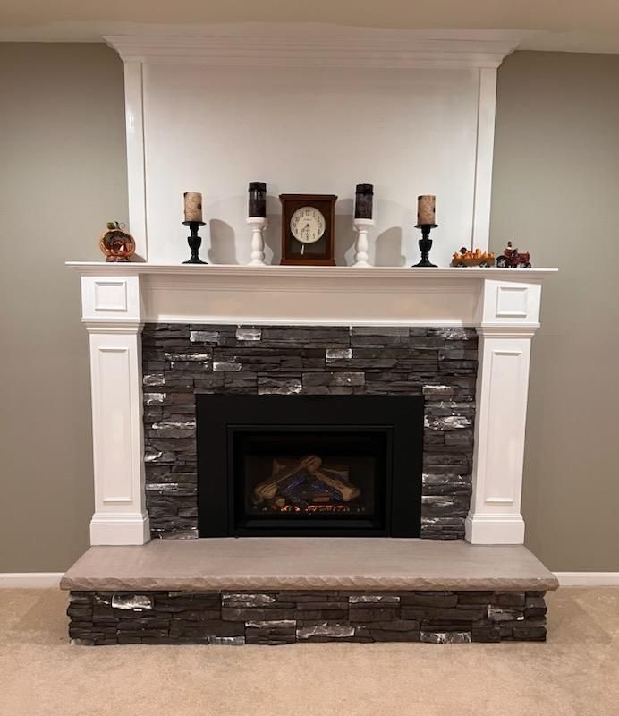 Stackstone Fireplace — Modern Fireplace With Brick Wall in Lan ghorne, PA