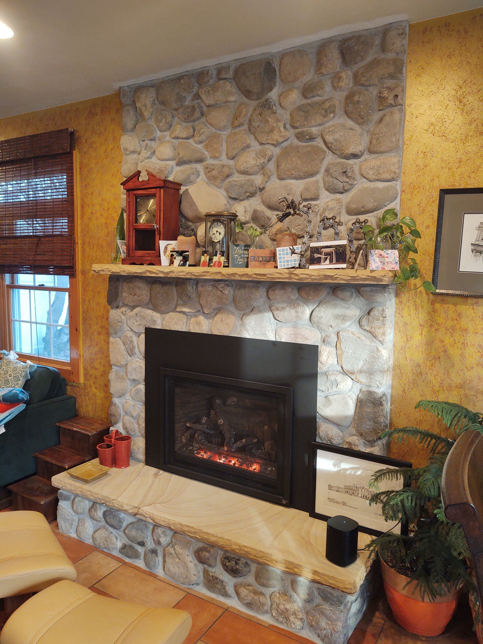 River Rock Fireplace — Modern Fireplace With Brick Wall in Lan ghorne, PA
