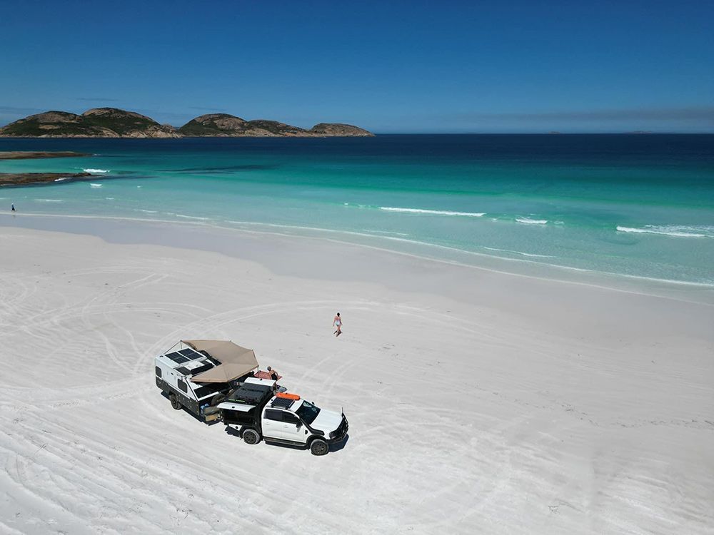 Scenic Aerial Perspective Showcasing a Beachside Camper — Ozzie Camper Trailers in Aitkenvale, QLD