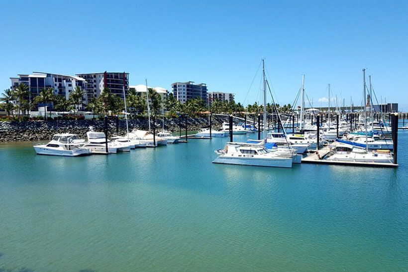 Boats Aligned Along The Marina, Showcasing Ozzie Camper Trailers' Nautical Elegance — Ozzie Camper Trailers in Mackay, QLD