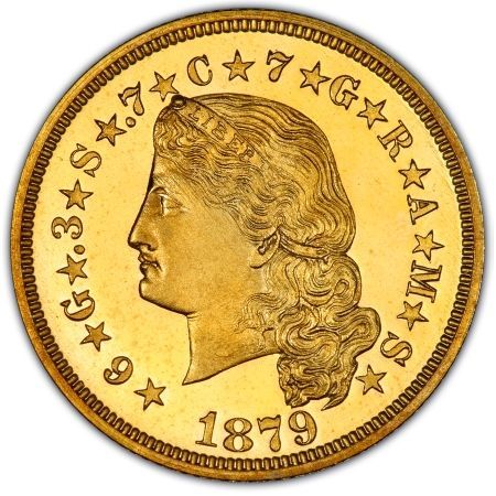 A gold coin with the year 1879 on it