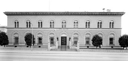 A black and white photo of a large building