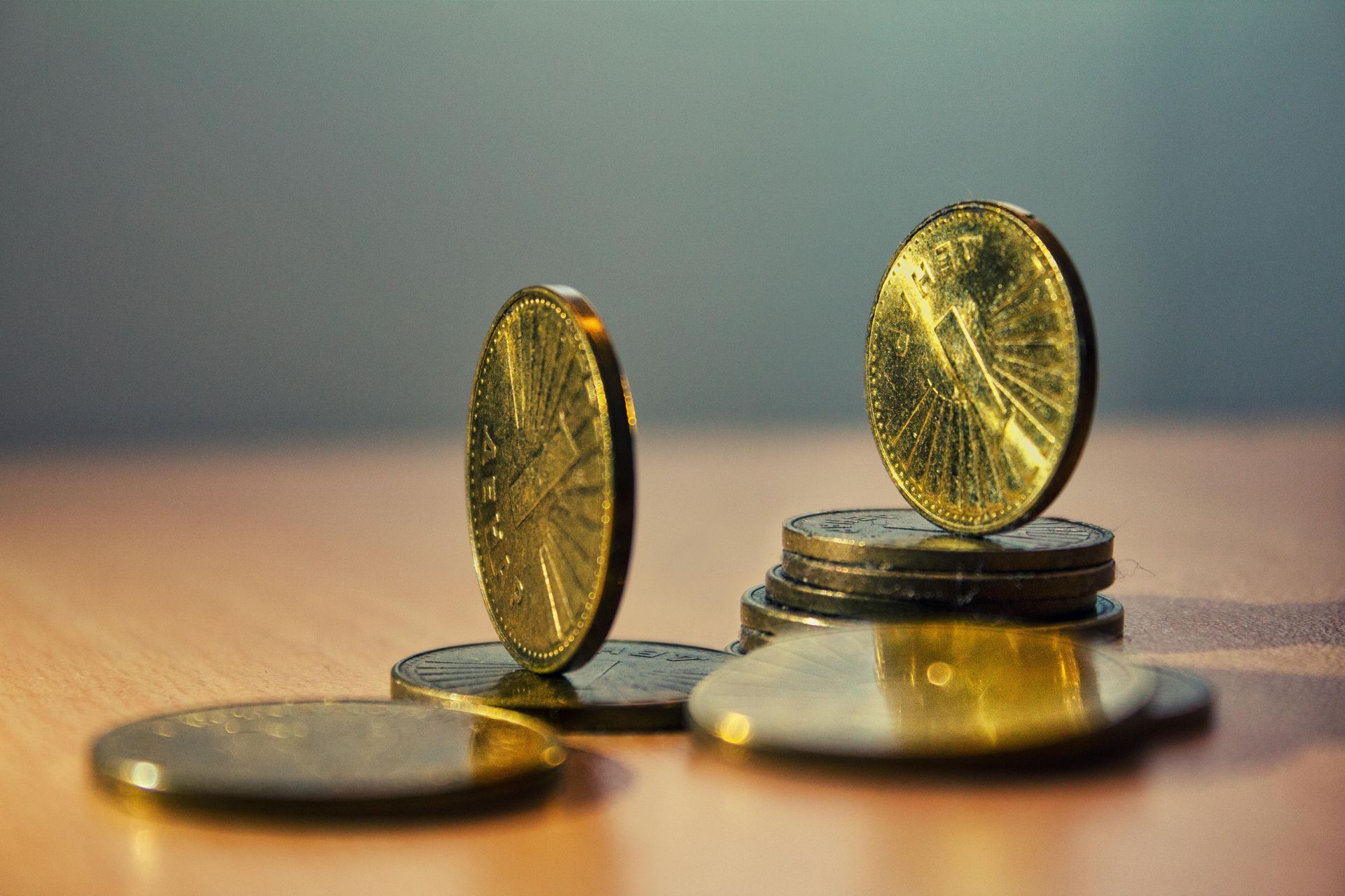 A painting of a group of men sitting around a table in a room.