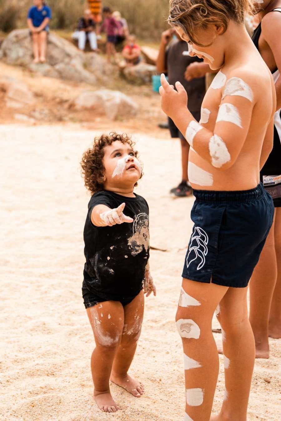 Baby Gazing Up at His Older Brother — Dinawan's Connection in Dubbo, NSW
