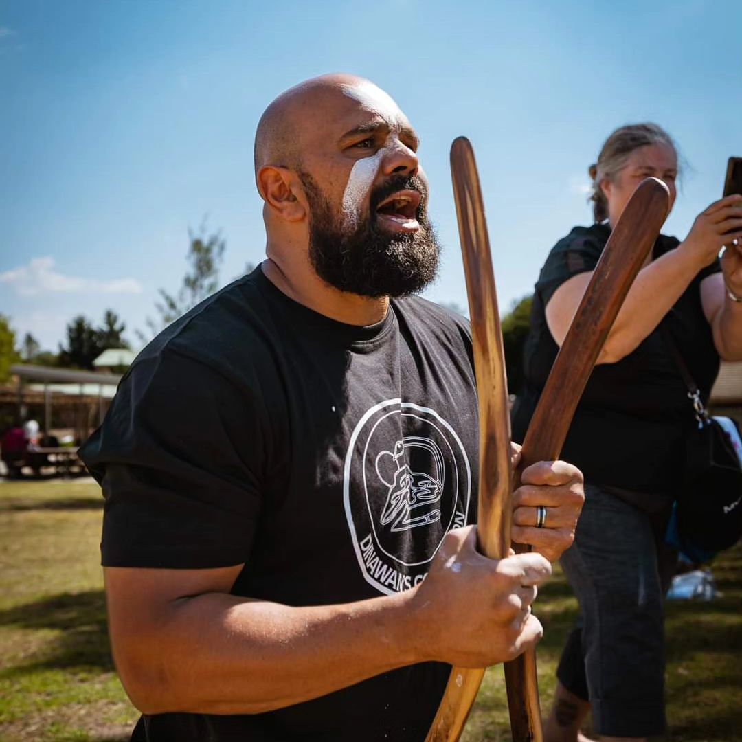 Man Holding Traditional Artefact — Dinawan's Connection in Dubbo, NSW