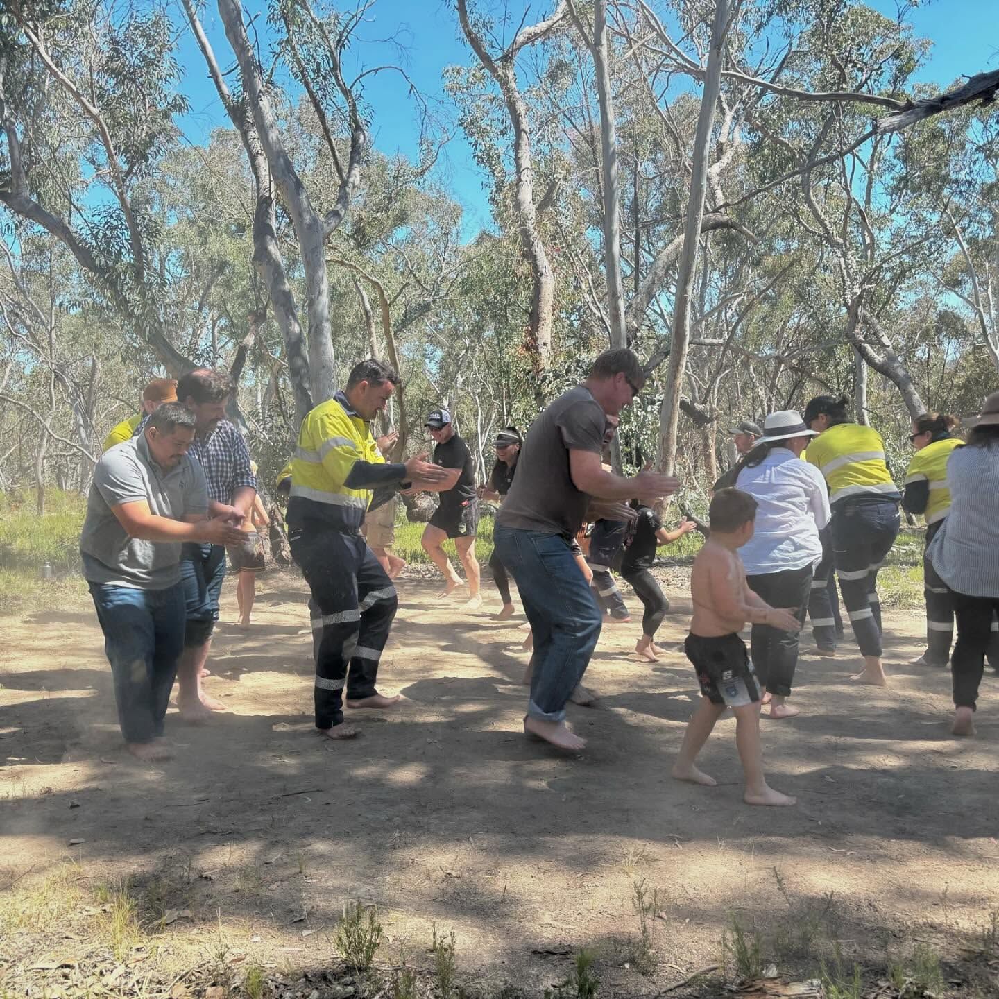 People in Casual Clothes and Workwear Dance Outdoors in a Sunny Forest Clearing — Dinawans Connection in Dubbo, NSW