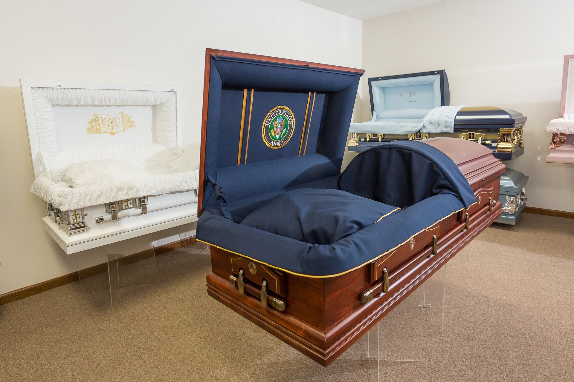 There are many different types of coffins in this room.