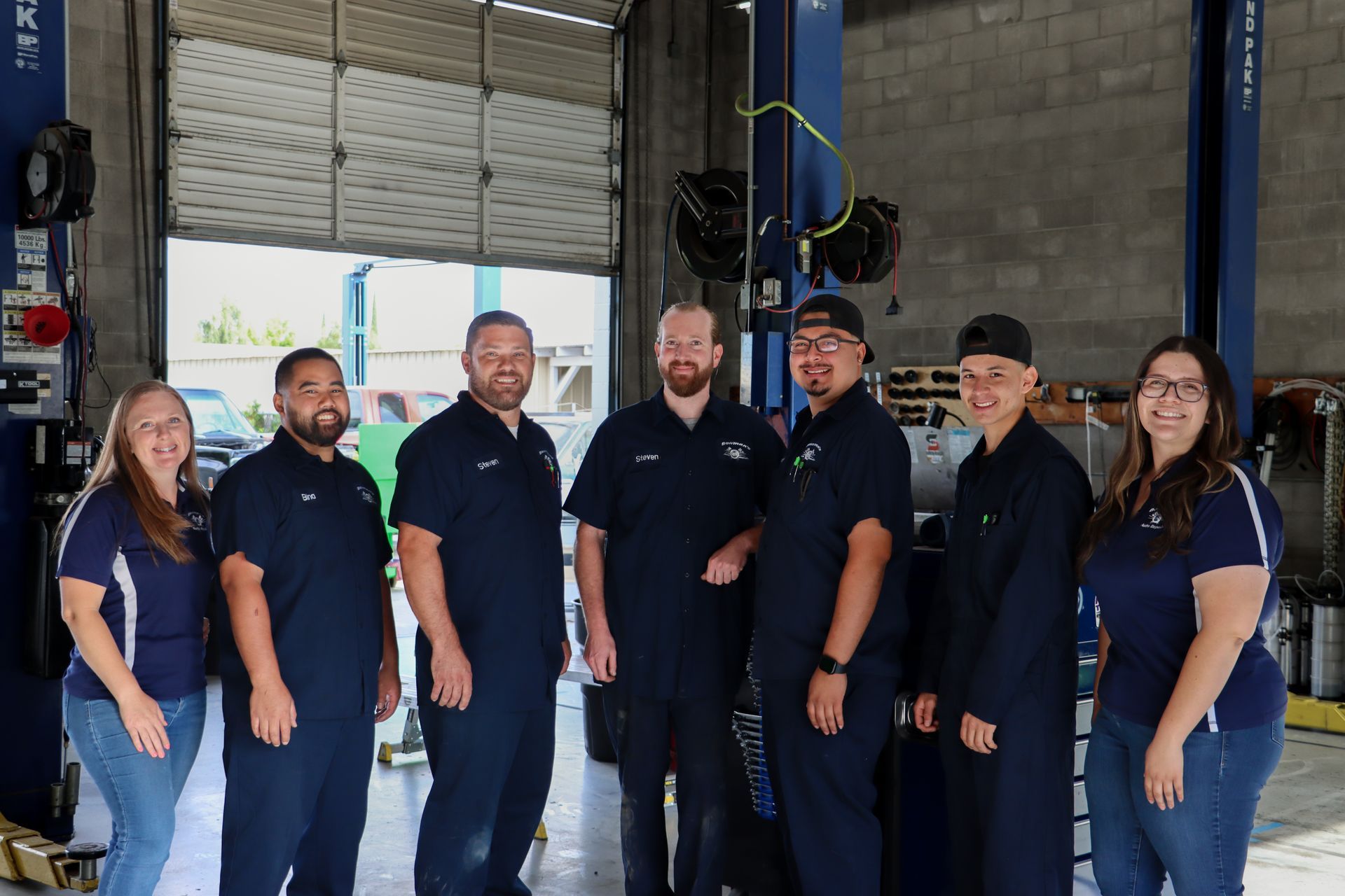 Group photograph of the Bowman's Auto Repair team