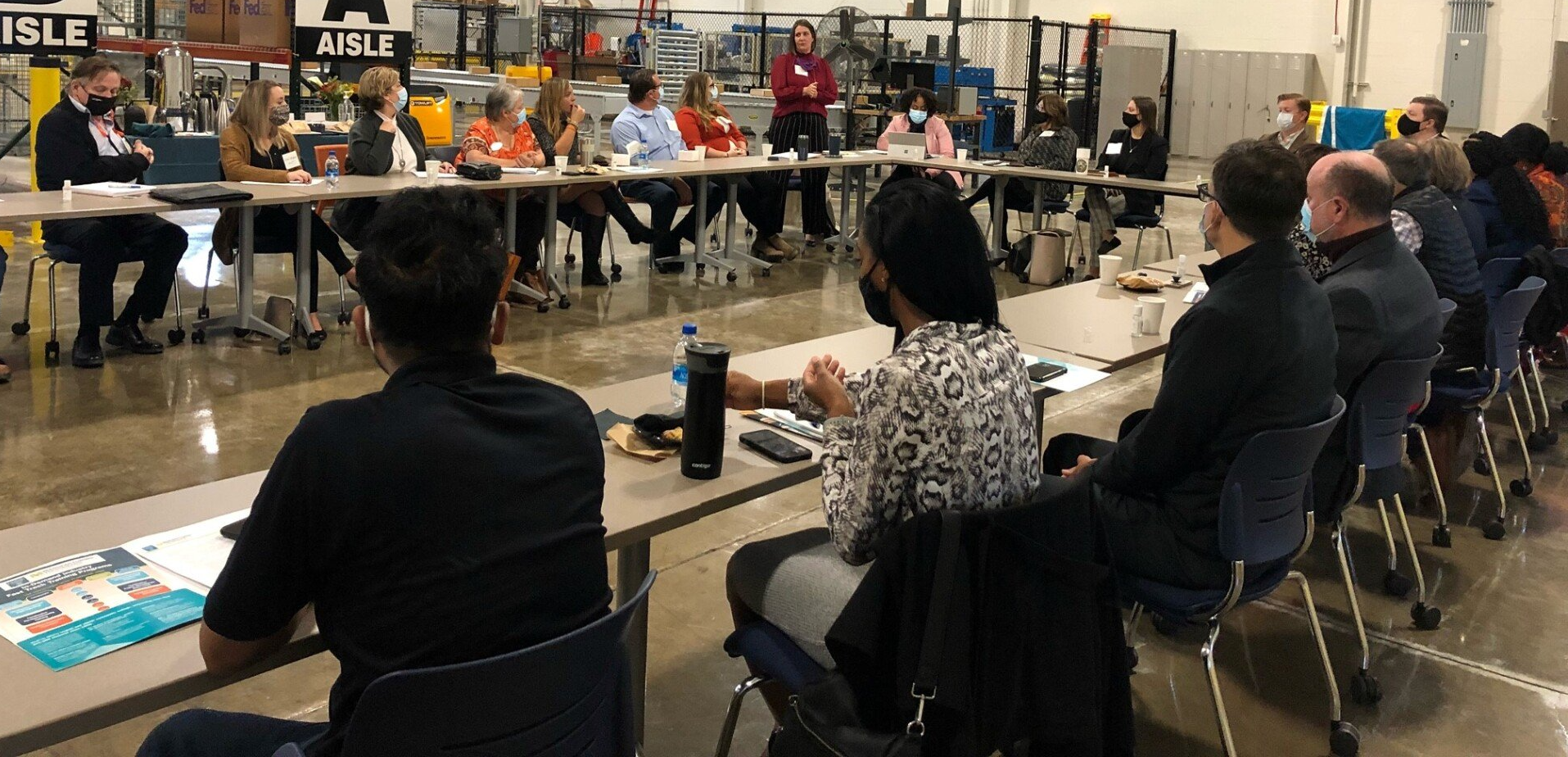 Euclid Workforce Development Roundtable Meeting Attendees Seated at Table