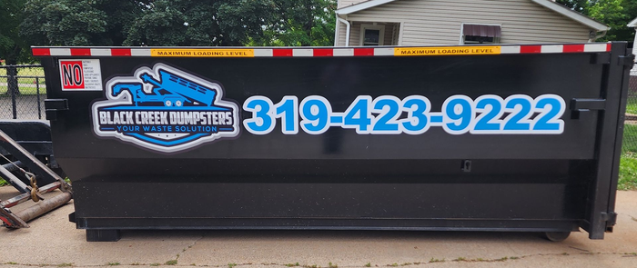 Black dumpster.