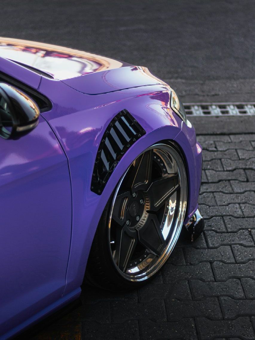 A close up of a car wheel with a mercedes logo on it