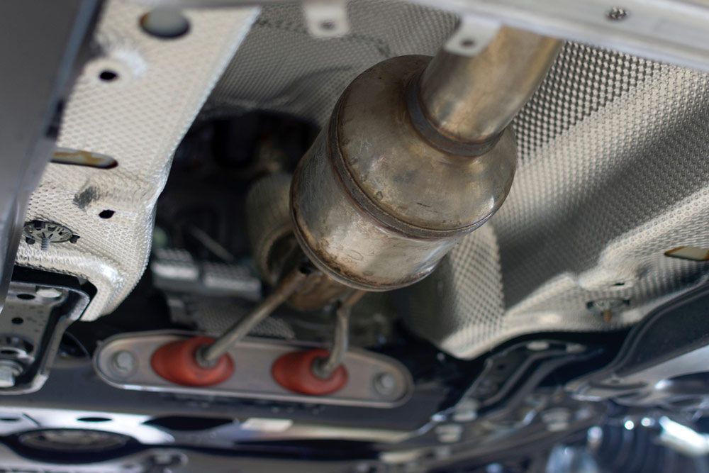 A Close Up Of The Underside Of A Car With An Exhaust Pipe  — DPF Centre In Dubbo, NSW