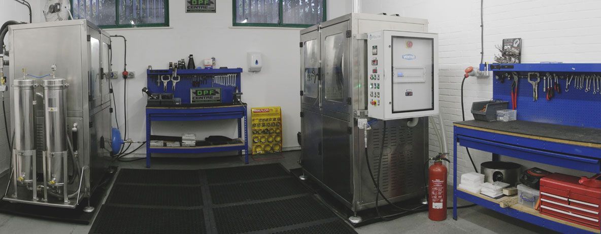 A Room With A Lot Of Machinery And A Fire Extinguisher — DPF Centre In Tamworth, NSW