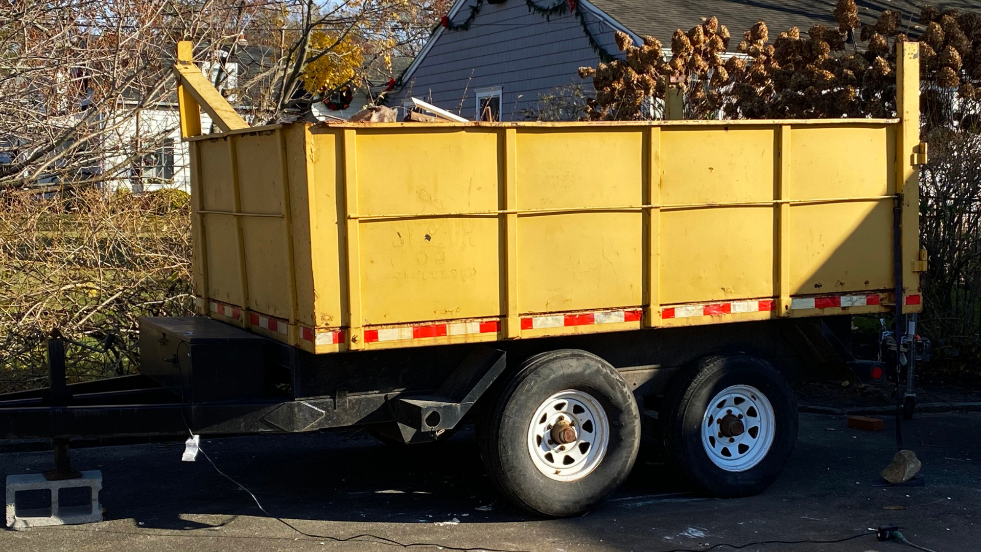Construction dumpster placed at residential renovation project in Summerville