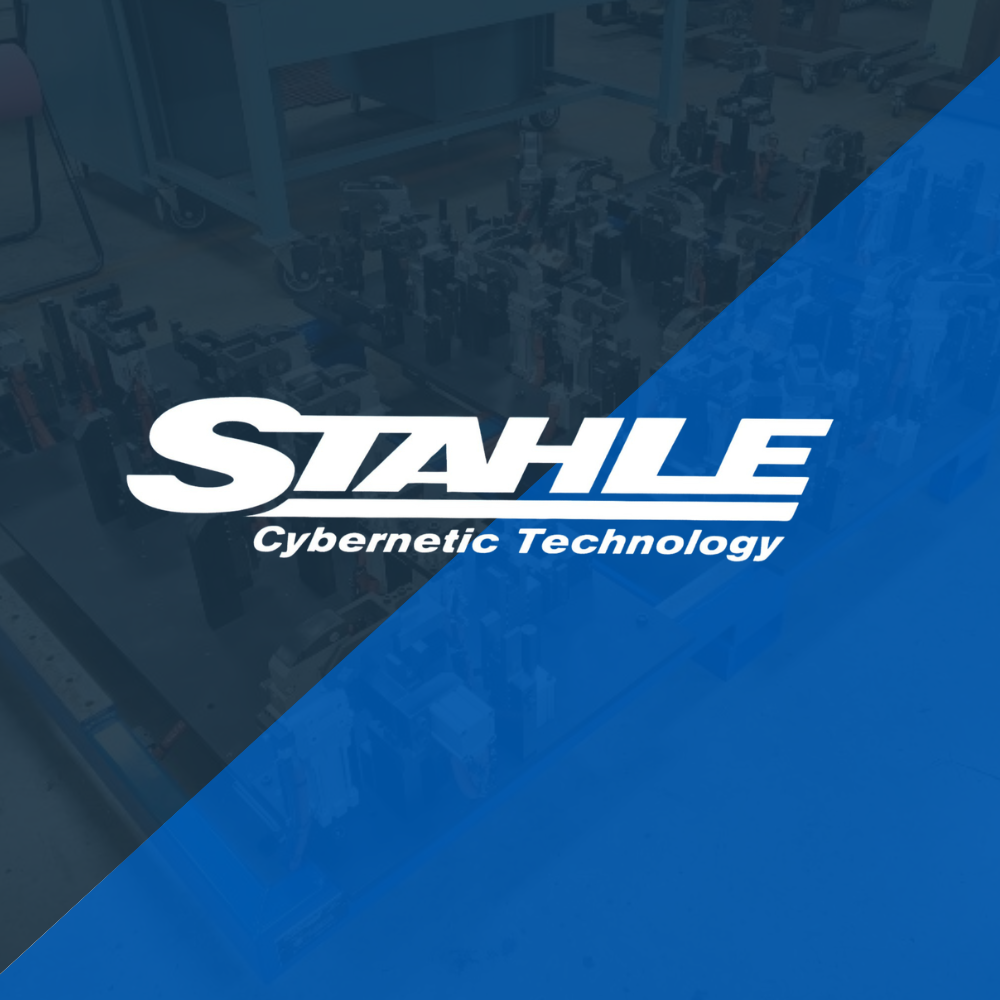 Stahle Cybernetic Technology logo over a blurred blue industrial background.