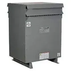 A transformer is sitting on top of a table on a white background.