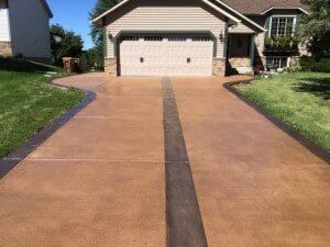 A home in Minneapolis, MN, with a new concrete driveway installation