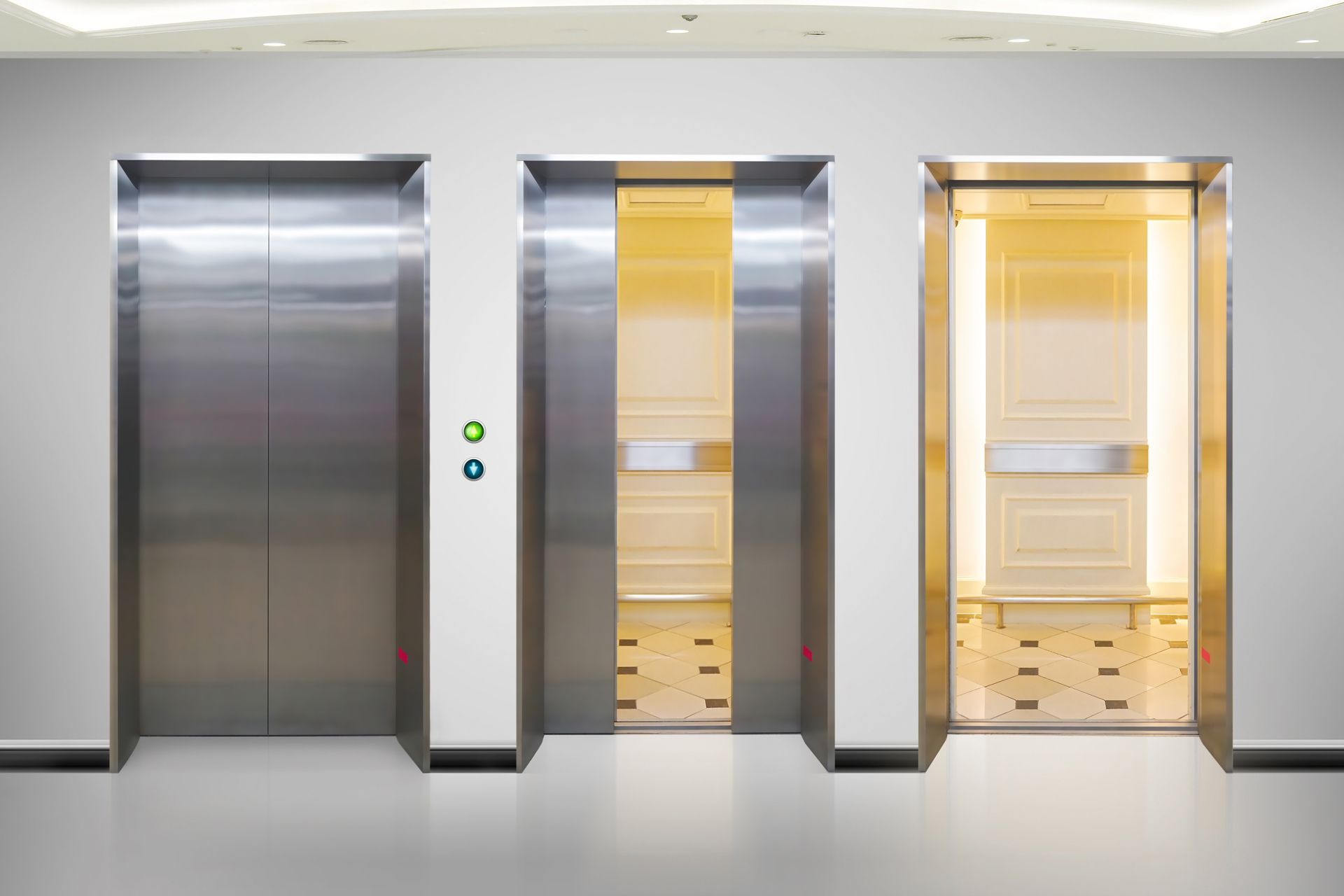 Three elevator doors in a lobby, one closed, one partially open, and one fully open with a yellow interior