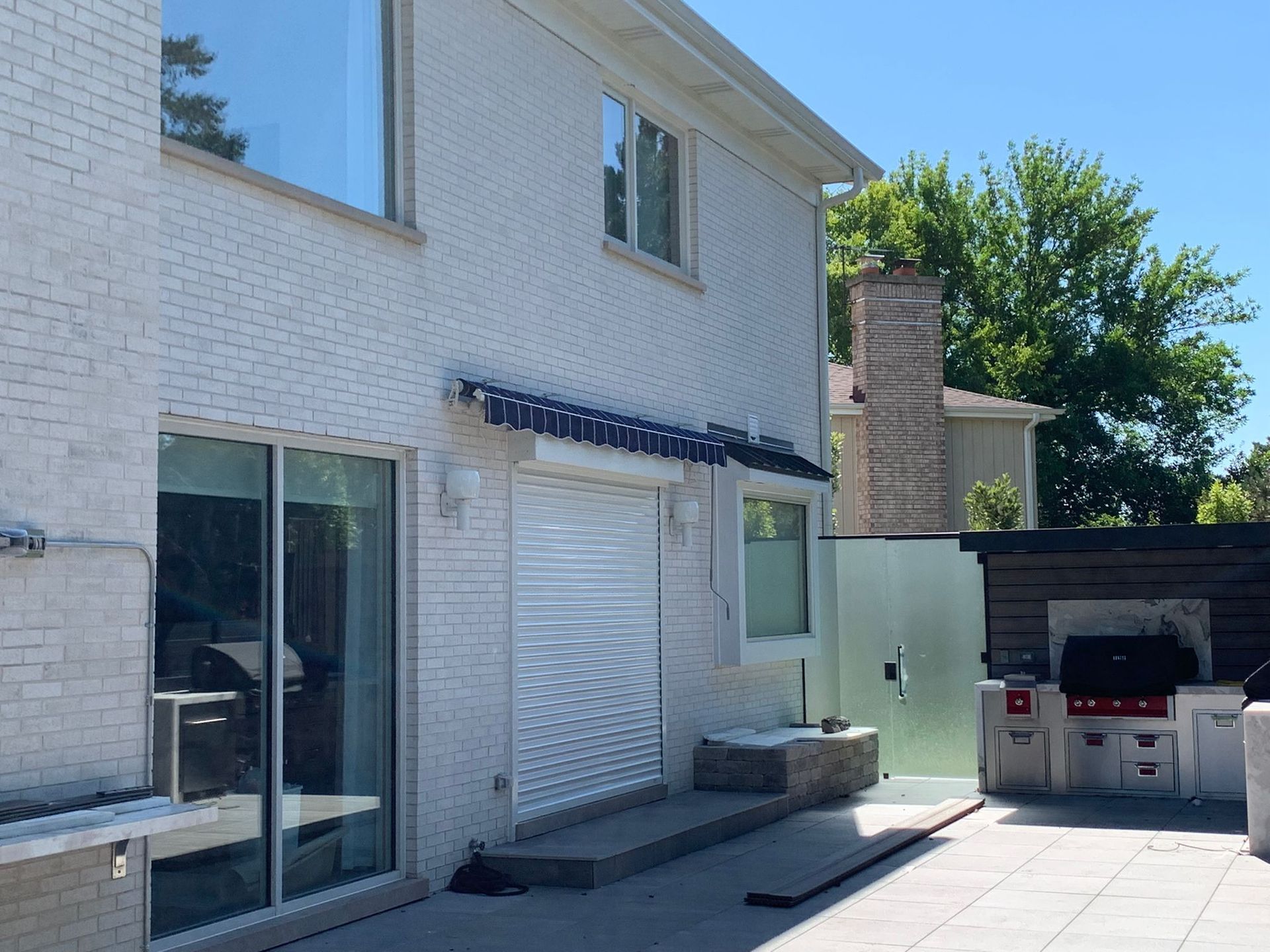 White Security Shutter Door Installed — Chicago, IL — National Shutter System