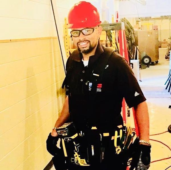 Man Wearing Hardhat — Chicago, IL — National Shutter System