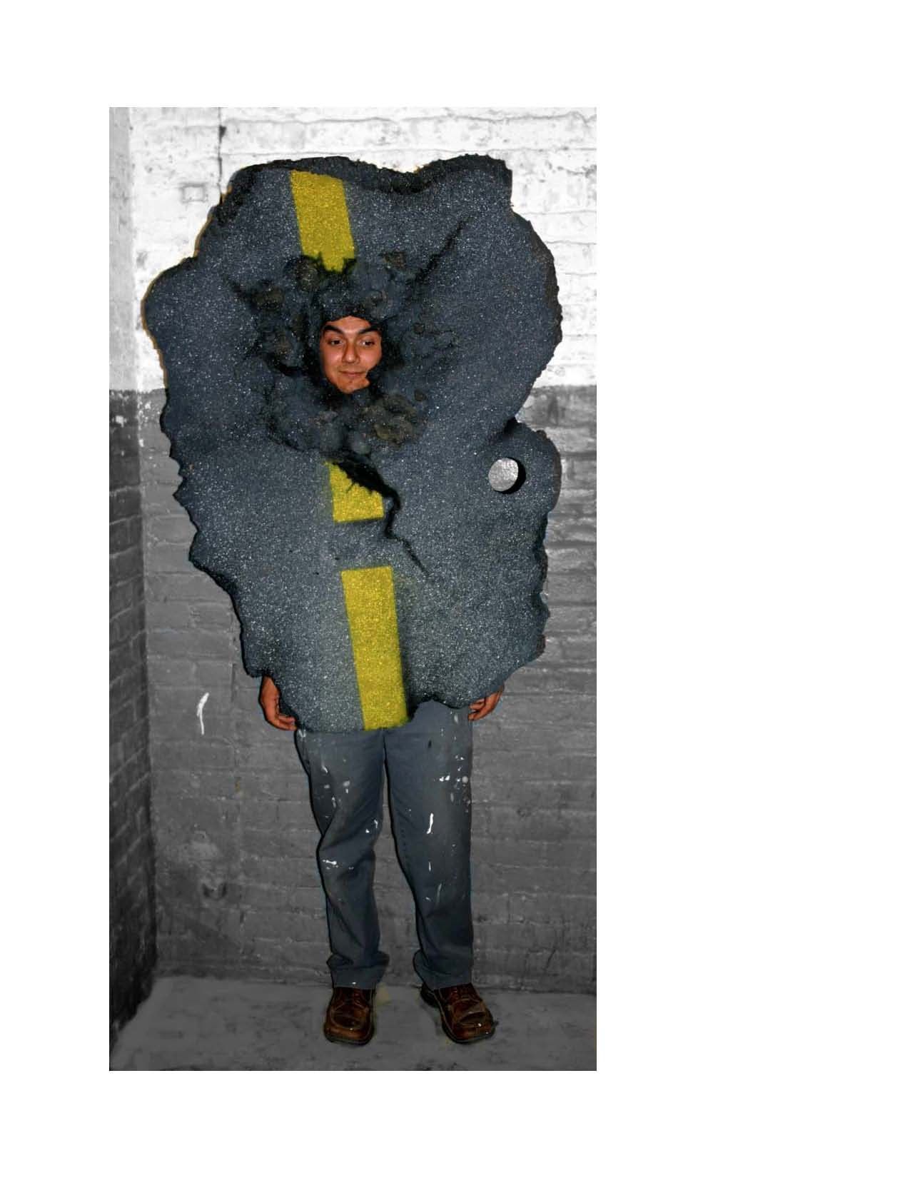 A person is wearing a costume that looks like a road.