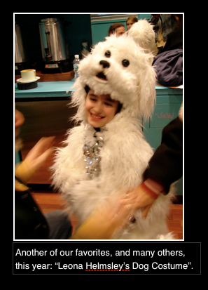 A picture of a child dressed in a dog costume