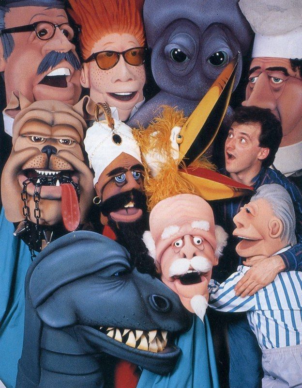 A group of cartoon characters are posing for a picture