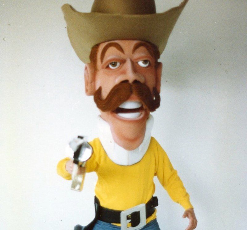 A cartoon of a man with a cowboy hat and mustache
