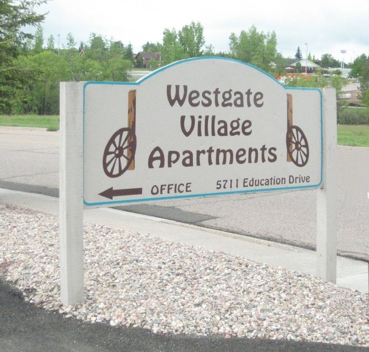 Western Village Apartments Welcome sign
