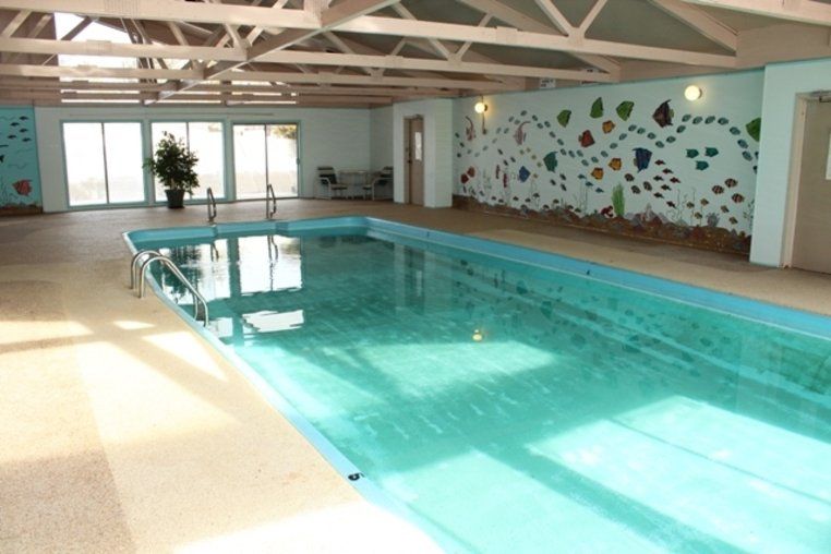 Interior shot of the pool at the Western Village Apartments