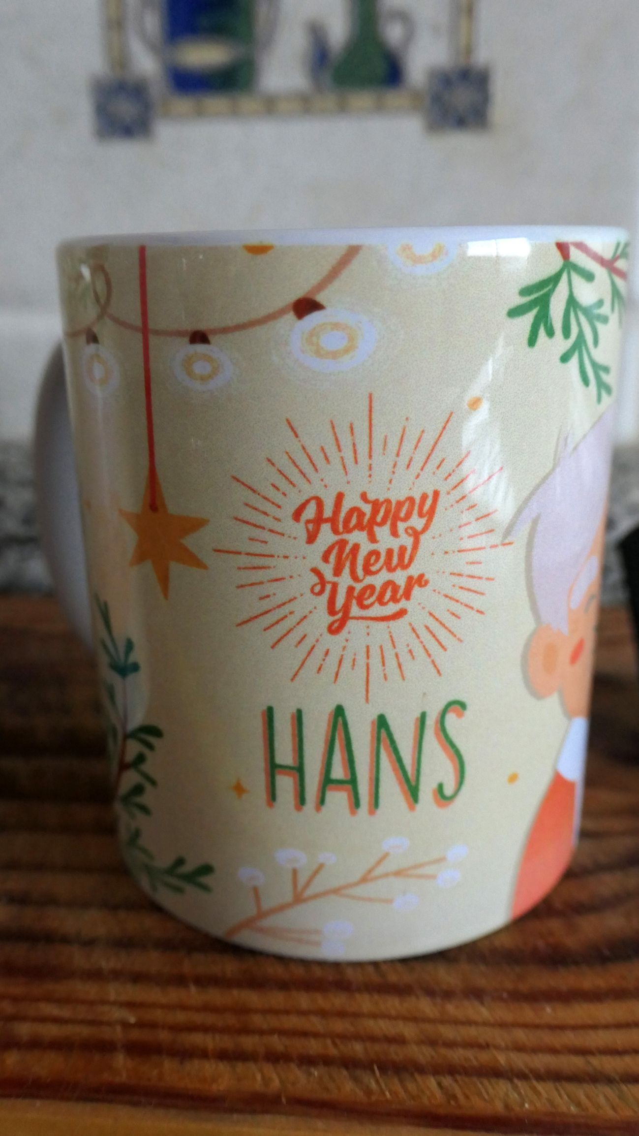 A mug that says happy new year hans on it