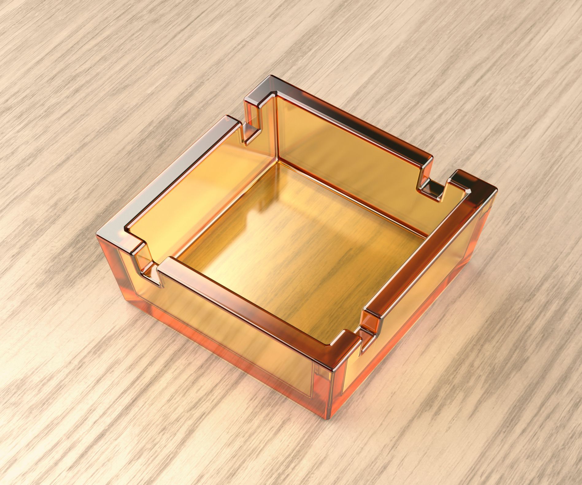 A square ashtray is sitting on a wooden table