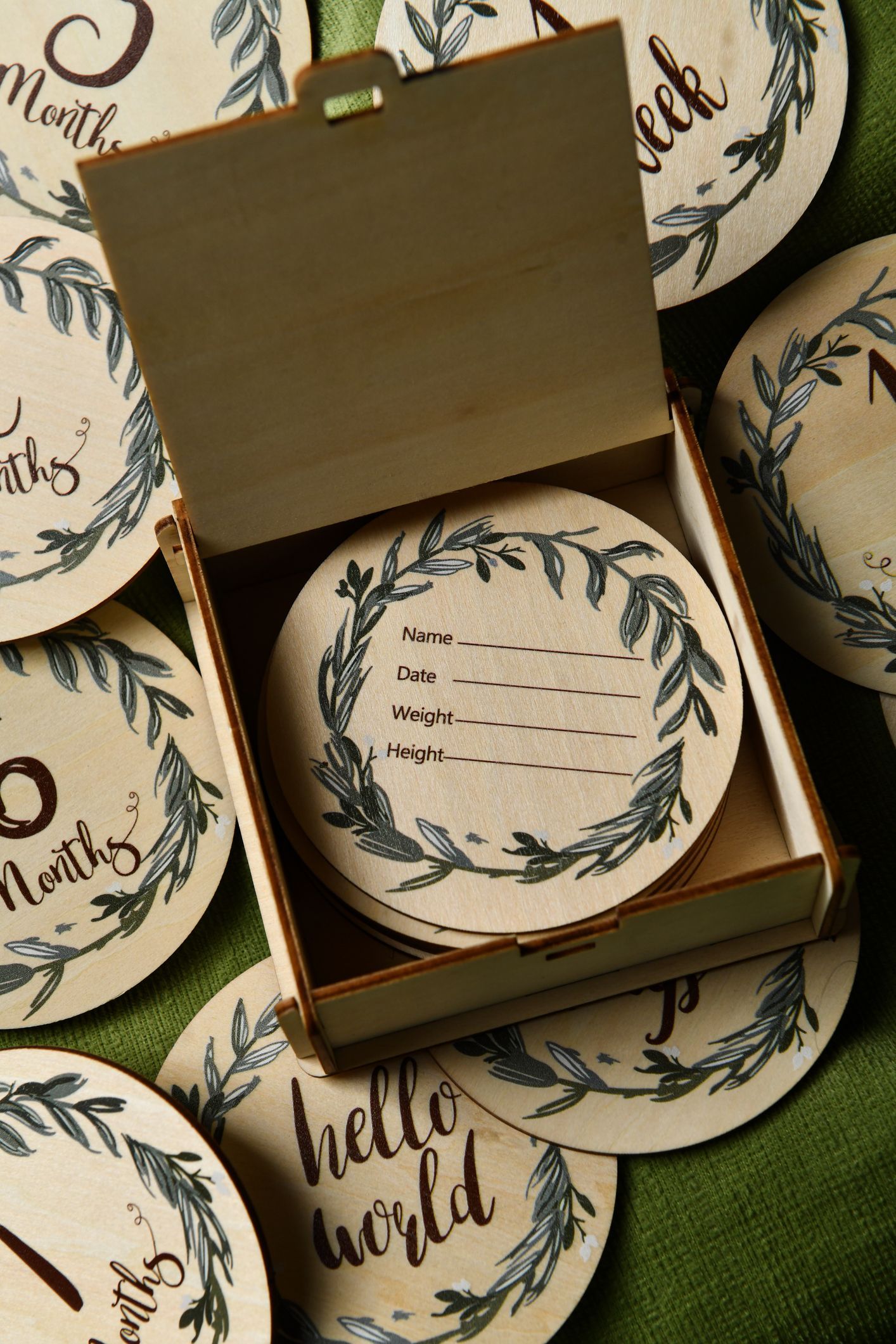 A box filled with plates that say hello world