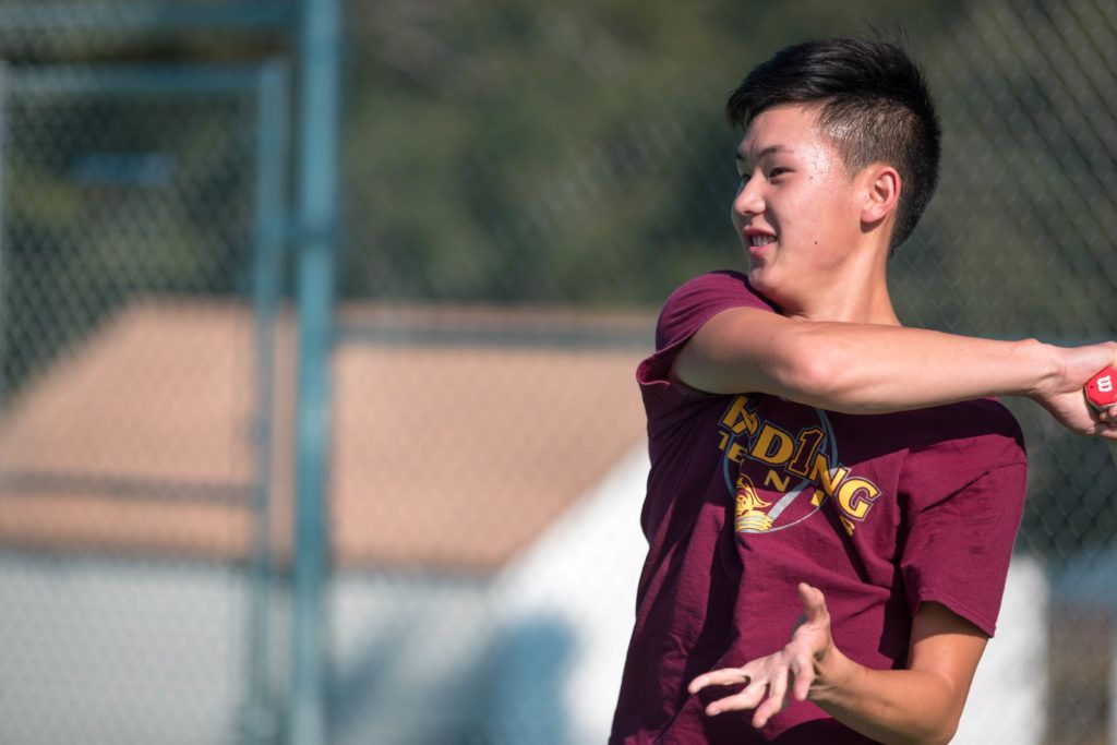 sput youth playing tennis