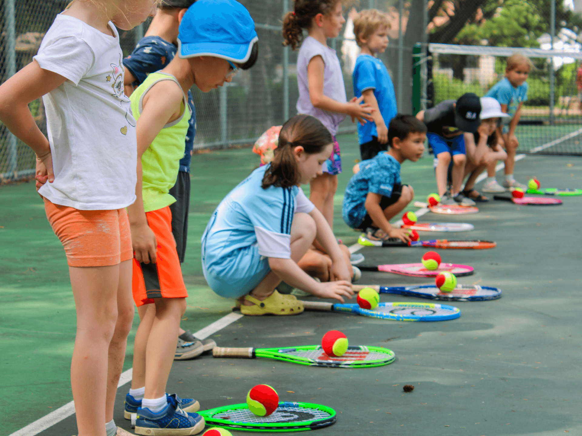 kids learning tennis